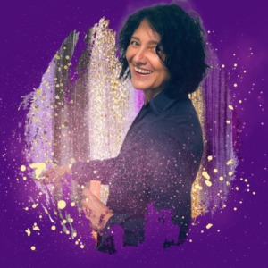 Woman with dark hair smiling and turning sidewards - background is violet and sparkling with gold